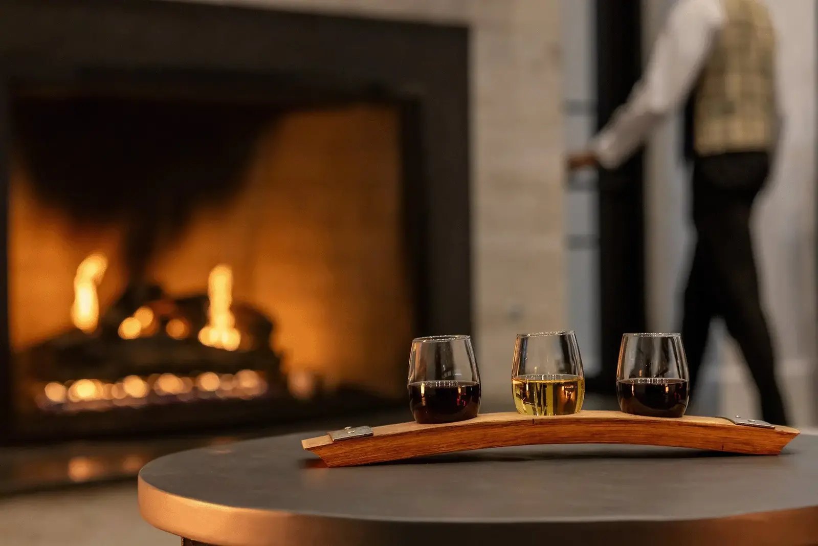 wine flight in front of fireplace