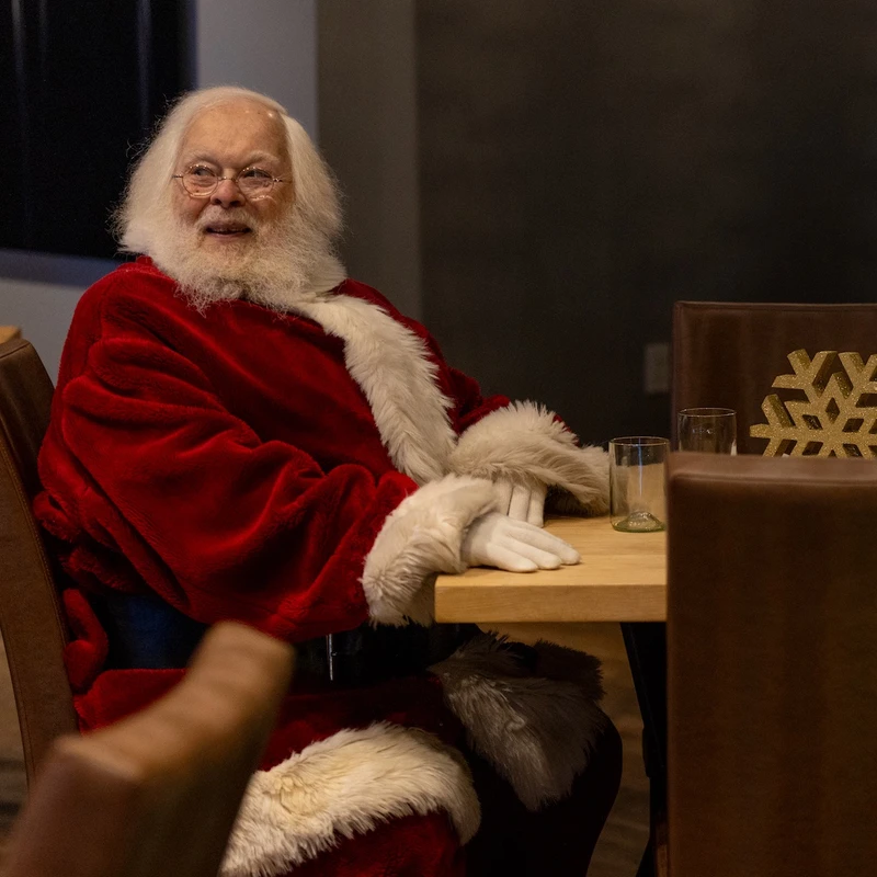 Santa at table with glasses